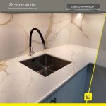 cuarzo-calacatta-gold-01B3-2025-remodelaciones-edison